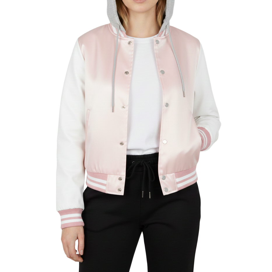 girl wearing a pink and white varsity jacket on a white background