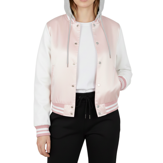 girl wearing a pink and white varsity jacket on a white background